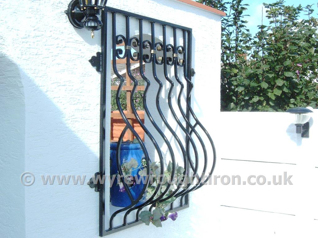 Spanish style wrought iron window grille created and fitted to a property in Fleetwood.